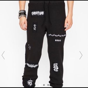 Dolls Kill thermal printed black pants